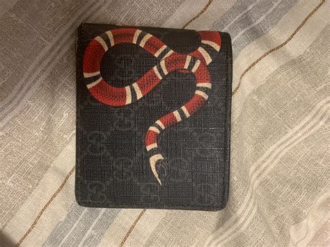 pochette uomo gucci serpente